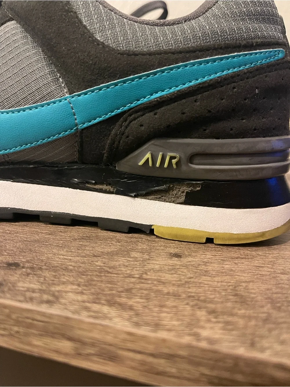 Nike women’s Gray & Teal Sneakers